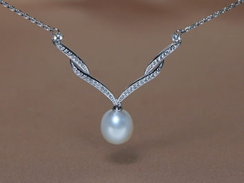 Stříbrný náhrdelník s pravou perlou a zirkony PN2040SH Stříbrný náhrdelník s pravou perlou a zirkony PN2040SH